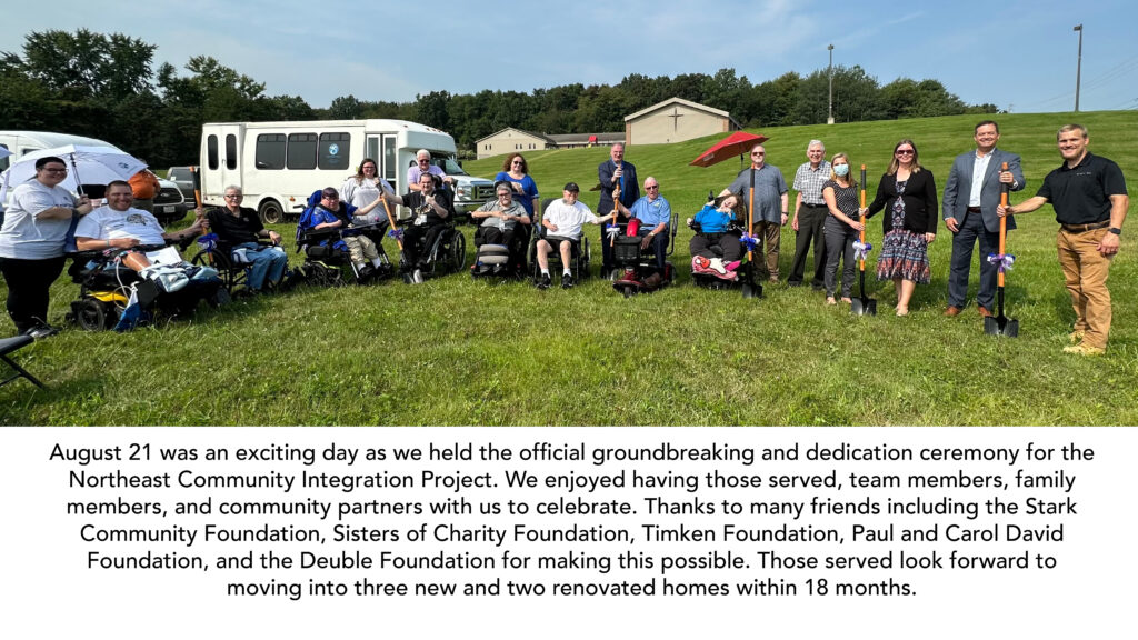 Community Integration Northeast Ohio. Smiling people with shovels for groundbreaking. Some in wheelchairs some are standing.