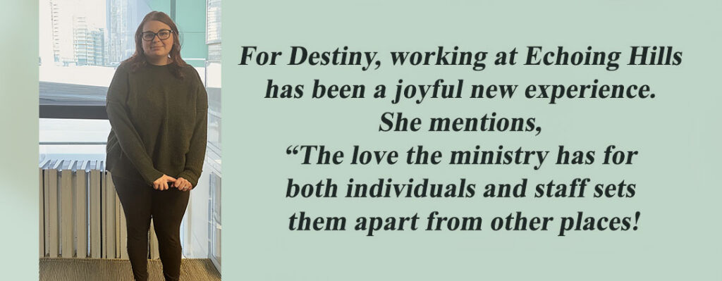 Destiny is wearing a beautiful olive green sweater while smiling slightly in a shy type of way. She works at Echoing Hills as a Direct Support Professional.