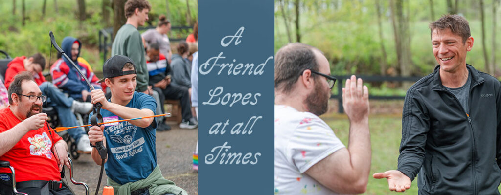 Friends at Camp Echoing Hills high fives, help with archery, sharing fun and fellowship.